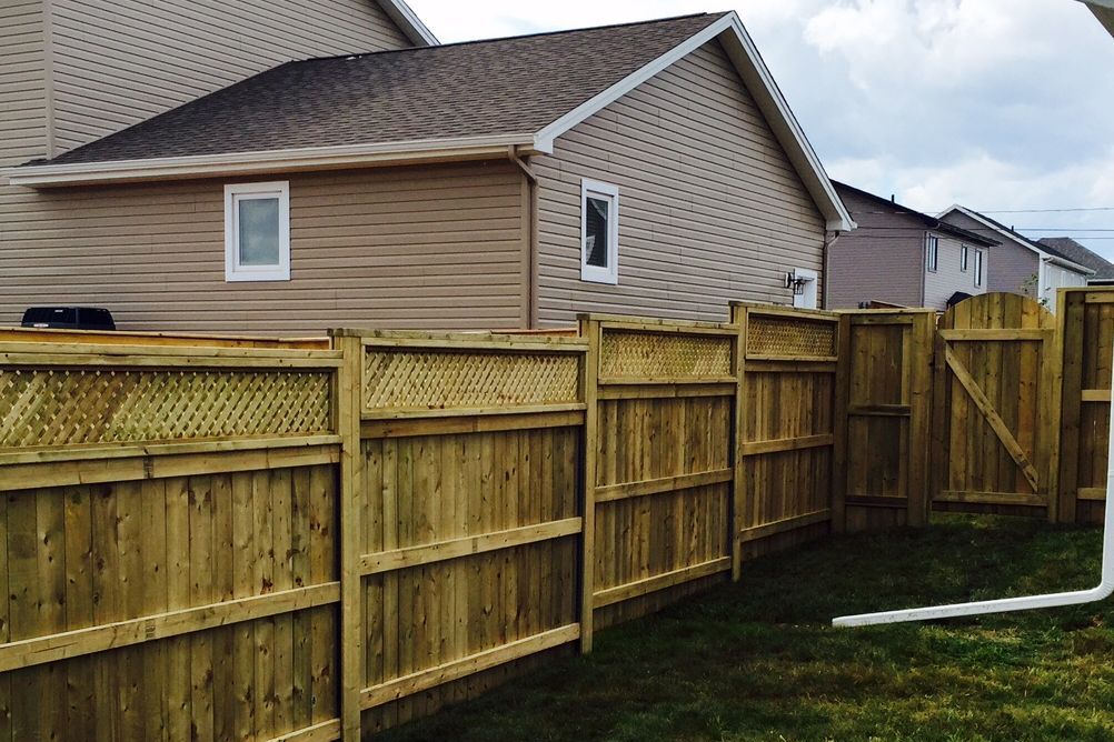 How to Install a Wood Fence on a Slope