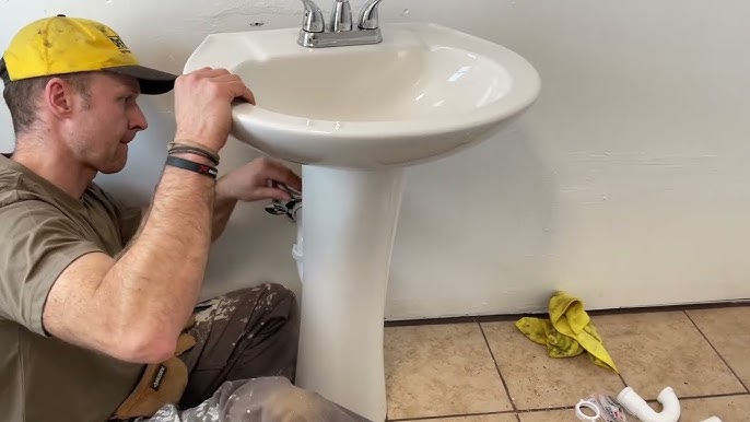 How to Hide Plumbing Behind a Pedestal Sink